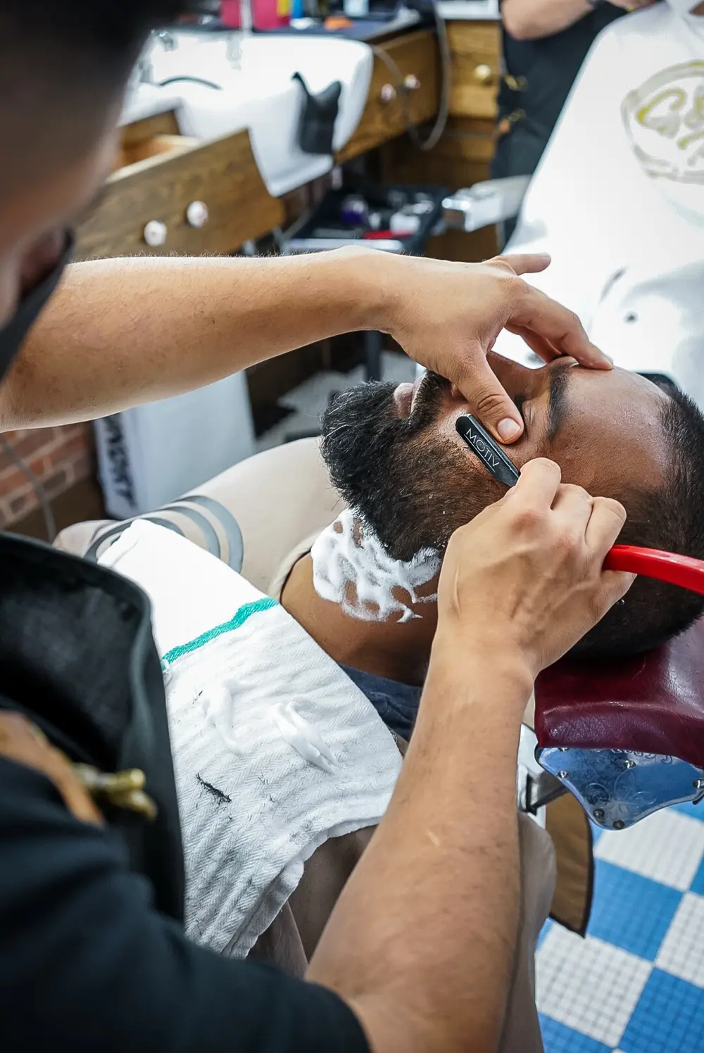 Traditional beard and razor service at Groomers & Pomade